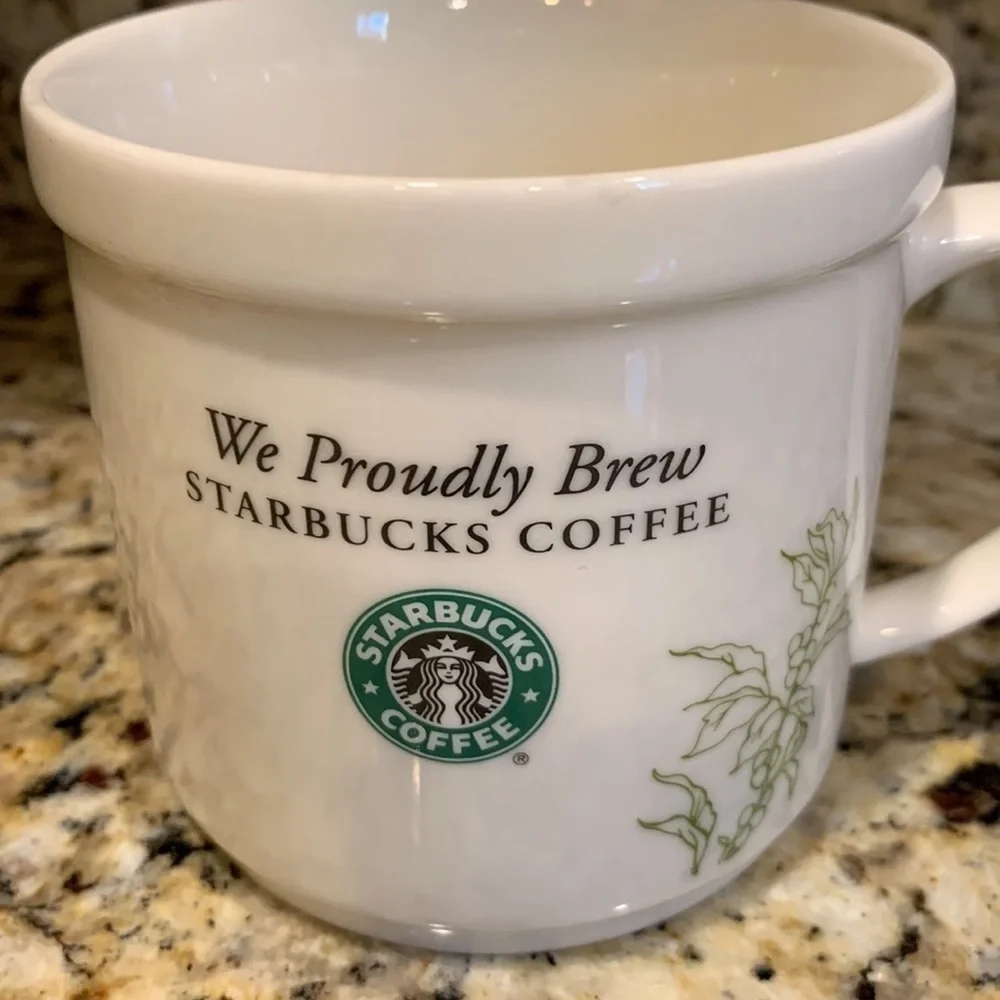 We Proudly Brew Starbucks coffee mug 12 ounces White and green